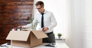 Businessman moving into a new office after an office decommission.