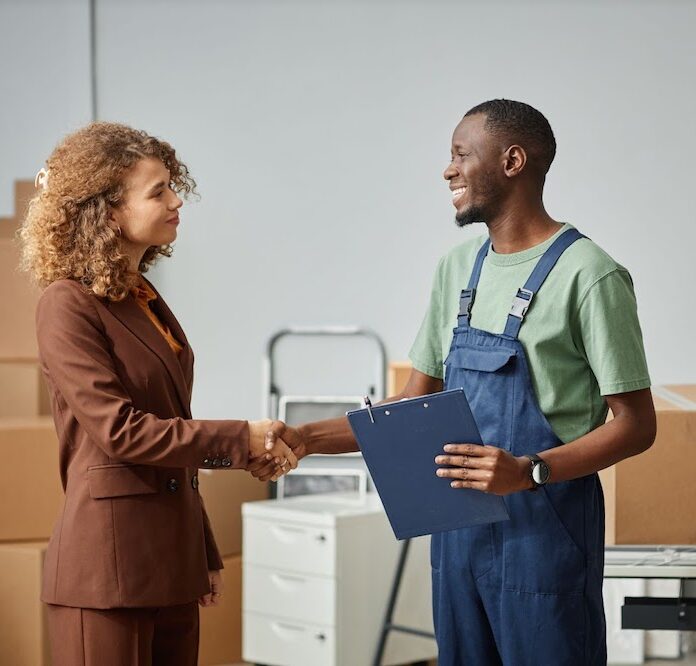 Woman working with a mover as part of her real estate referral network