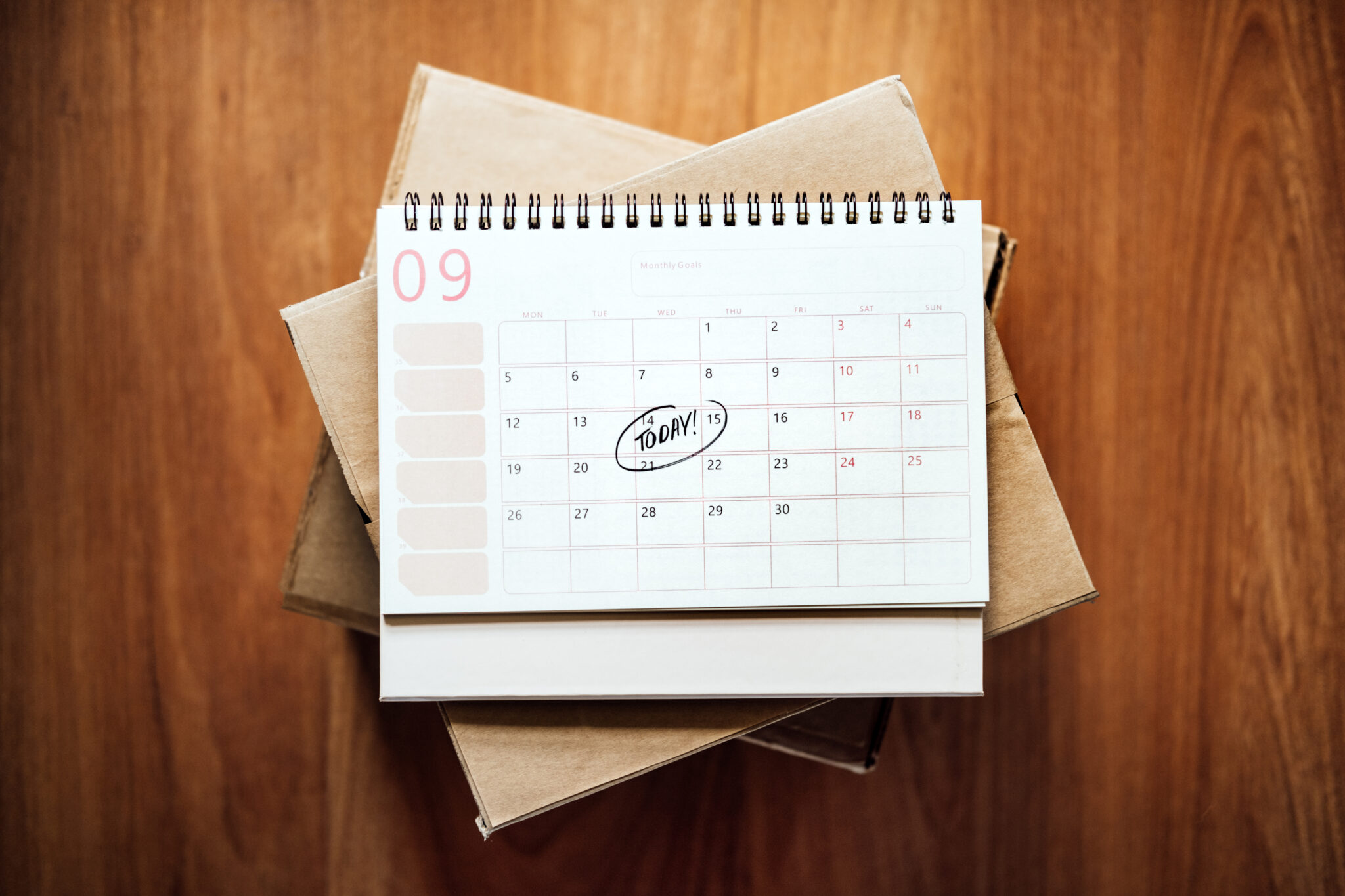 Same Day delivery Ship From Store. Faster Delivery. Many Cardboard boxes and calendar with the date today ready for delivery