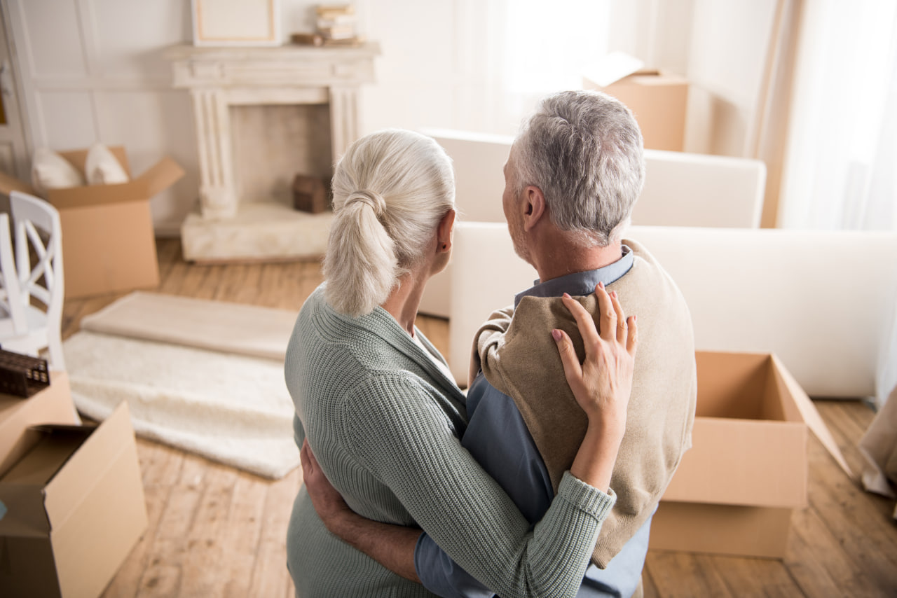 Elderly couple following senior relocation tips and advice for moving with aging parents.