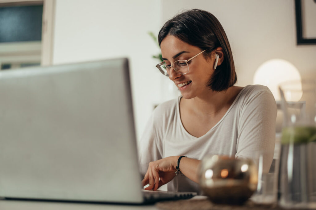 A woman researching Texas antique movers skilled in protecting irreplaceable items during a move